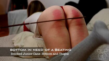 Bottom in need of a Beating - Smoked Junior Cane -Bottom and Thighs